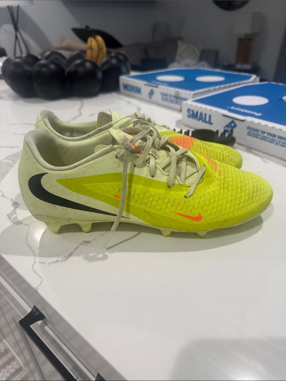 Nike Neon Yellow Soccer Cleats with Black Swoosh and Orange Accents